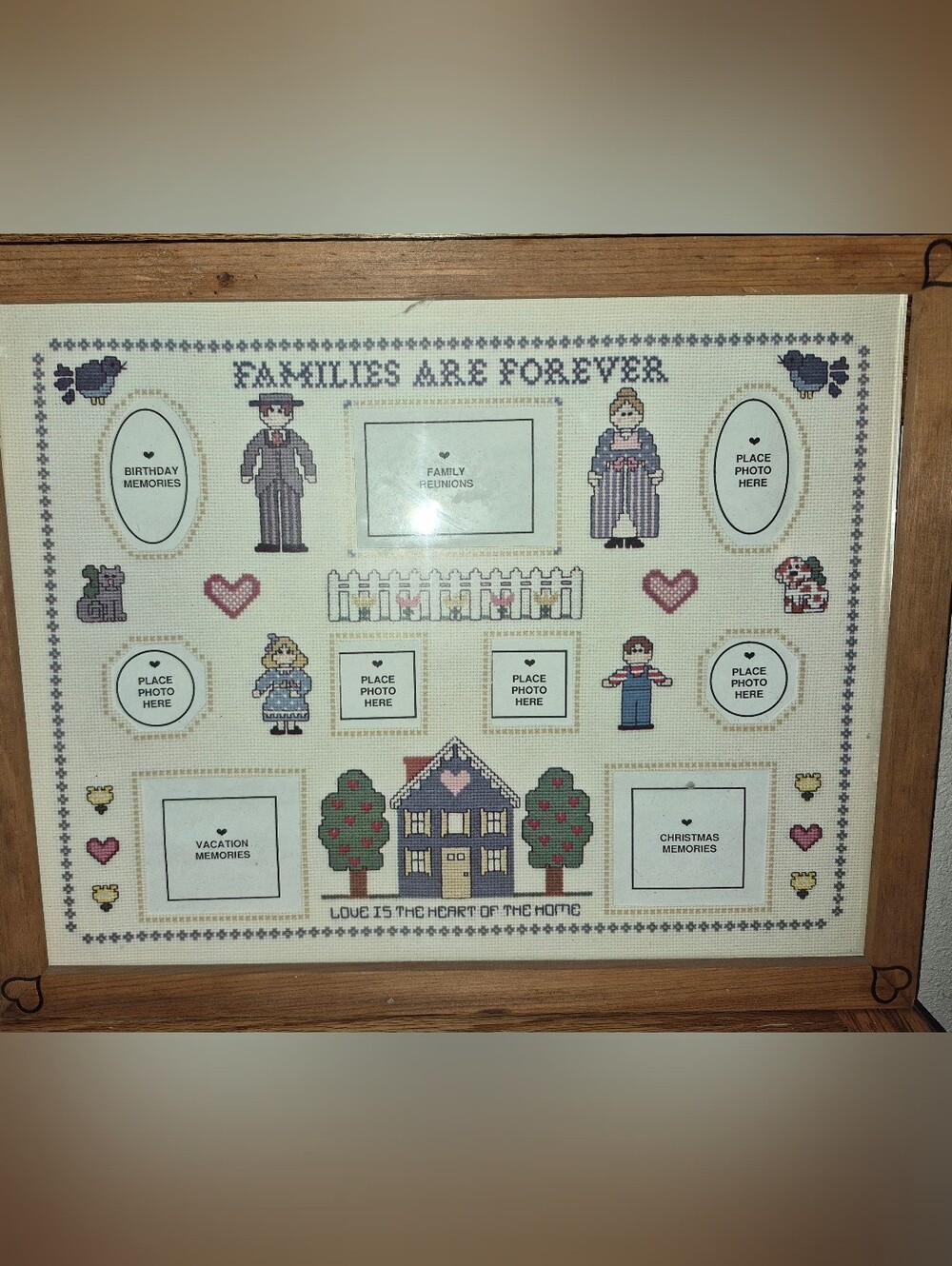 Framed, Handmade Cross-Stitch photo collage w/ the phrase "Families Are Forever"